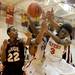 Willow Run's Kareem Lovelance Jr.  (10), center left, and McKenzie Dunlap (3), center right, fight for a rebound against River Rouge's Robert Metcalf, left, and Devonte Johnson, far right. Angela J. Cesere | AnnArbor.com
